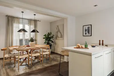a bedroom with a large bed and a window at Tarra - 4 bedrooms and terrace in Sant Pere in Barcelona