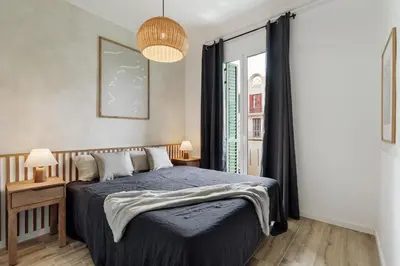 a bathroom with a washing machine and a shower at Tulum - 3 bedrooms and balcony in Gràcia in Barcelona