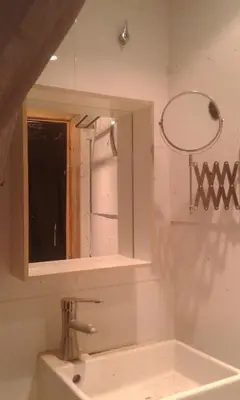 a bathroom with a sink and a mirror at 016 DUPLEX centric in Barcelona