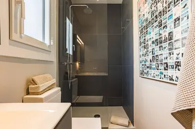 a bathroom with a shower and a toilet and a sink at Cozy Apartment in Barcelona in Barcelona