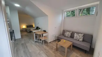 a living room with a couch and a table at Vallgorguina Uno in Vallgorguina