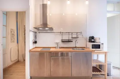 a kitchen with a sink and a counter top at Charm and Comfort in the Heart of Sant Antoni, Barcelona in Barcelona