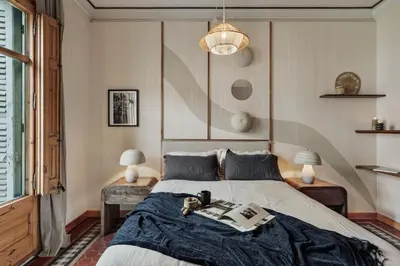 a living room with a table and chairs at Lura - 2 bedrooms and terrace in Eixample Esquerra in Barcelona