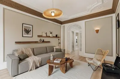 a balcony with a table and chairs and a building at Quira - 4 bedrooms and balcony in Eixample Dreta in Barcelona