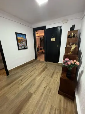 a room with a hallway with a staircase and a door at Hermoso Apartamento cerca a Barcelona in Sant Adria de Besos