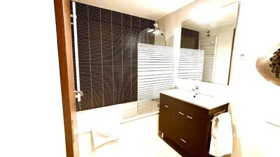 a bathroom with a sink and a mirror at Dúplex zona olimpica by Prestigi in Terrassa