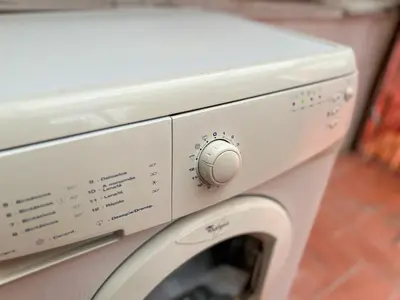 a white washing machine with its door open at Stay Unique Apartment Martínez de la Rosa in Barcelona