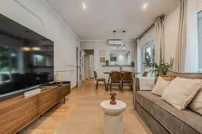a living room with a couch and a table at NEW Refurbished Modern Apartment in Barcelona