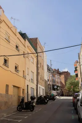 a group of motorcycles parked on a city street at Estudio con encanto en Barcelona in Barcelona