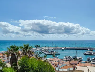 a view of a marina with boats in the water at Horizon Views by Hello Homes Sitges in Sitges