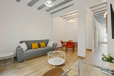 a city street with clothes hanging on a clothes line at Pet-Friendly Monthly 1BR in Central BCN in Barcelona