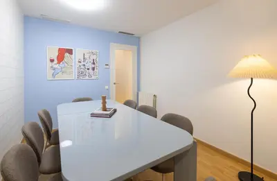 a conference room with a white table and chairs at Stay U-nique Apartment Castanyer II in Barcelona