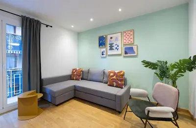 a living room with a couch and two chairs at Stay U-nique Apartment Castanyer II in Barcelona