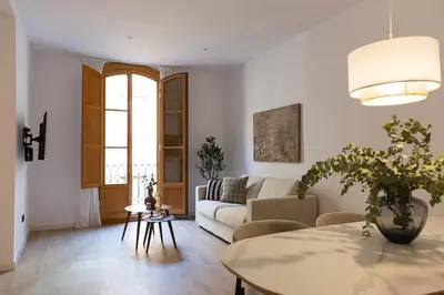 a living room with a couch and a table at Barcelona - Gracia 2-A in Barcelona