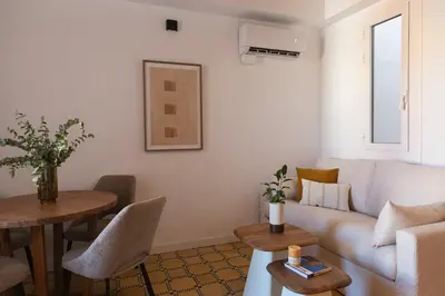 a living room with a couch and a table at Barcelona - Gracia 4-B in Barcelona