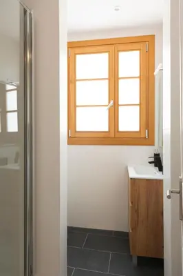 a bathroom with a sink and a window at Barcelona - Gracia 4-B in Barcelona