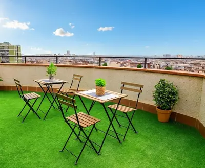 a bedroom with a bed and a table and chairs at Entire apartment, accessible ground floor in Hospitalet de Llobregat