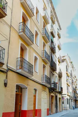 a building with balconies on the side of a street at Barcelona - Gracia 3-A in Barcelona