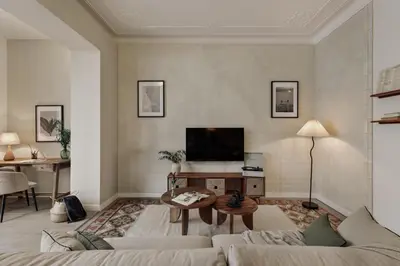 a kitchen with white cabinets and a sink at Savegre - 3 bedrooms in Eixample Esquerra in Barcelona