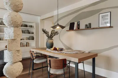 a living room with a couch and a table at Cabuy - 1 bedroom in La Dreta de l'Eixample in Barcelona