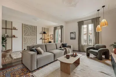 a dining room with a table and chairs at Mirra - 5 bedrooms and terrace in Eixample Dreta in Barcelona