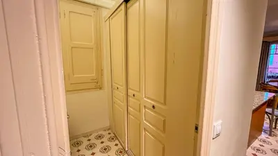 a room with a closet with a door at 