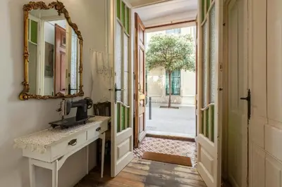 a bathroom with a sink and a mirror at Vintage home in Barcelona