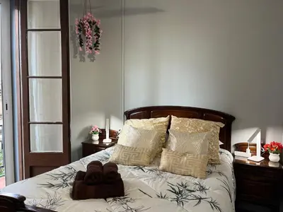 a bed with a stuffed animal on top of it at Apartamento Fira Barcelona, 20' Barcelona centro, 4 hab - 8 pers in Hospitalet de Llobregat