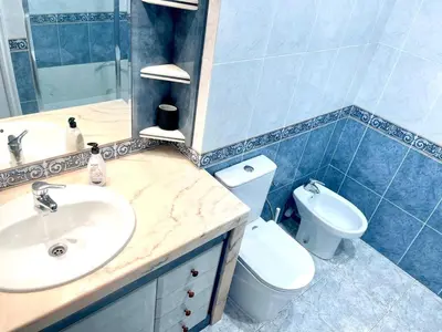 a bathroom with a sink and a toilet at Camins de Montserrat in El Bruc