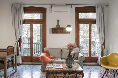 a living room with a couch and a table at Brummell Apartments Eixample Derecha/Ballroom in Barcelona