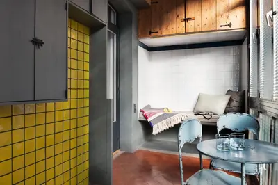a room with a table and chairs and a bench at Brummell Apartments Eixample Derecha/Ballroom in Barcelona