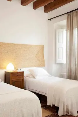 a bathroom with a toilet and a shower and a sink at Ca l'Andreu Ecoturisme in Tiana
