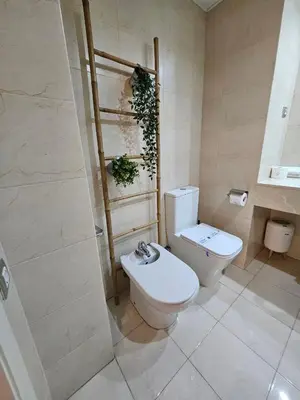 a bedroom with a large white bed and wooden floors at Ramblas flat 3Bedroom and Pool Min 32 days in Barcelona