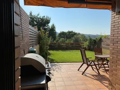 a kitchen with a grill and a sink in a building at House for 8-14 people 25 min from Barcelona, Montserrat, Sitges, Penedes, Sant Cugat in Abrera