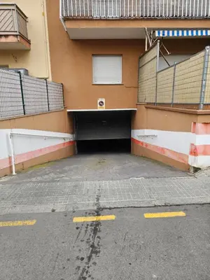 a parking lot in front of a building at Rosari II - Vivienda Privada con Parking in Vilassar de Mar