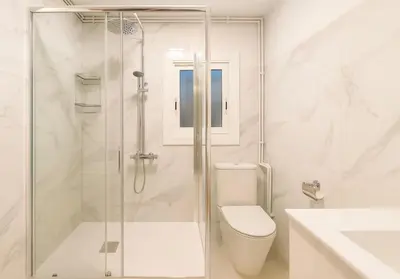 a bathroom with a shower and a toilet and a sink at New renovate apartment near of the sea in Barcelona