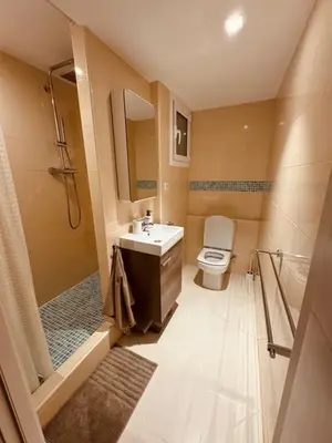 a bathroom with a sink and a toilet and a shower at Apartment in Ciutat Vella Born in Barcelona
