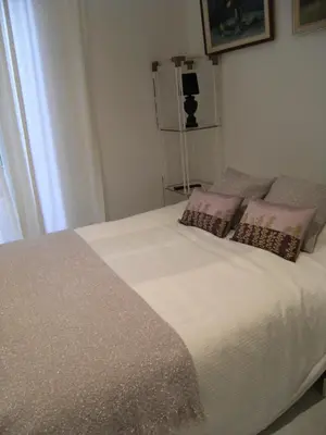 a bed with two pillows on it in a bedroom at Blanca Subur in Sitges