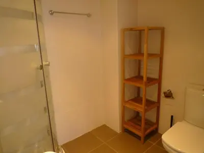 a bathroom with a toilet and a glass shower at 3-Apartament full equiped, next to Mobile Congres in Hospitalet de Llobregat