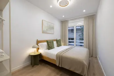 a bedroom with a bed and a window at Stay U-nique Apartment Passeig d´Amunt in Barcelona
