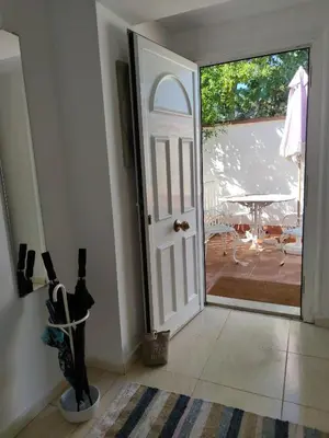 an open door to a porch with a patio at Suite de invitados independiente in Cerdanyola del Valles