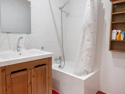 a bathroom with a shower and a sink and a tub at Apartment amazing Sagrada familia view II in Barcelona