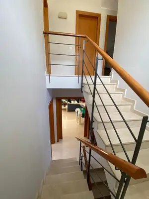a staircase leading up to the second floor of a house at Shambala B&B in Sitges