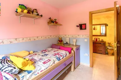 a childs bedroom with a bed and a desk at Catalunya Casas Costa Dorada Paradise, 2 km from beach! in Cunit
