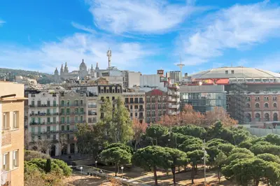 a view of a city with trees and buildings at Downtown penthouse with views of Barcelona in Barcelona