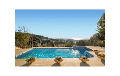 a swimming pool with a view of the ocean at Gorgeous Home In Arenys De Munt in Arenys de Munt