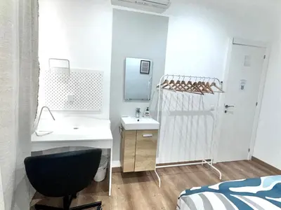 a bathroom with a sink and a shower and a toilet at Habitación 5 Sant Pau in Barcelona
