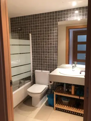 a bathroom with a toilet and a sink at Apartamento Barcelona CCIB-Playa-Diagonal mar in Barcelona