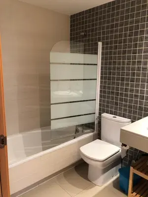 a bathroom with a tub and a toilet and a sink at Apartamento Barcelona CCIB-Playa-Diagonal mar in Barcelona