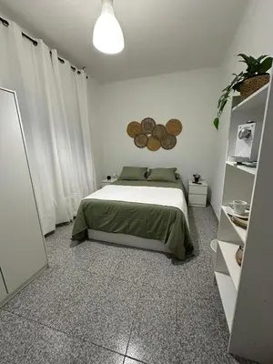 a bedroom with a bed in a room at Mirian in Barcelona